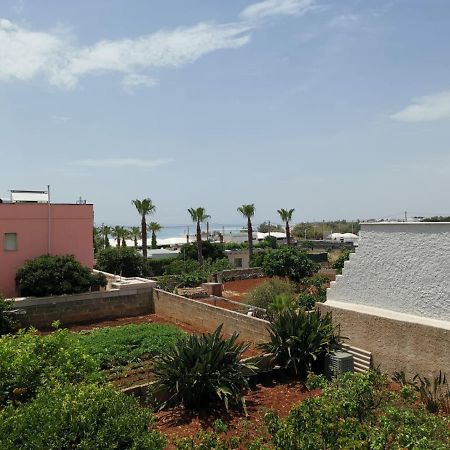 Casa Tramonto Vista Mare Apartment มารินาดิเปสโคลูเซ ภายนอก รูปภาพ