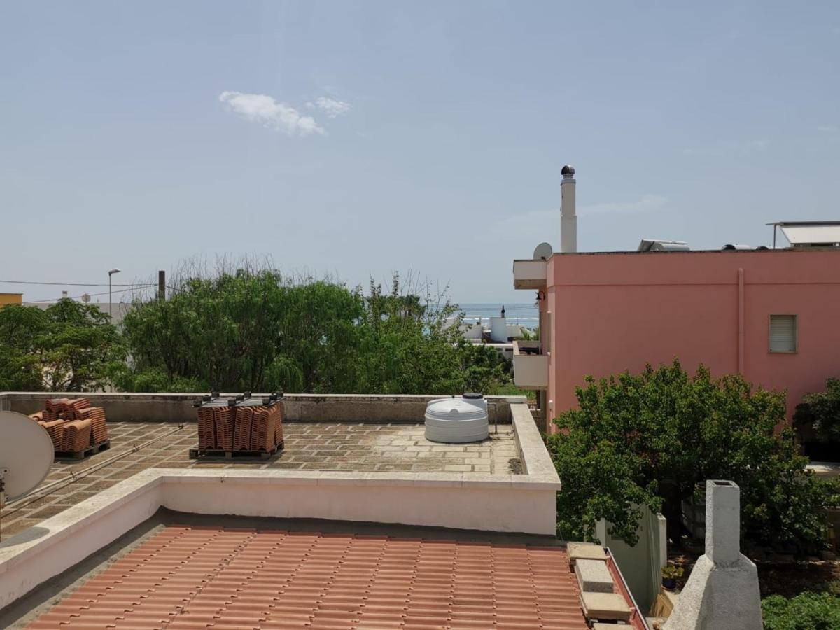 Casa Tramonto Vista Mare Apartment มารินาดิเปสโคลูเซ ภายนอก รูปภาพ